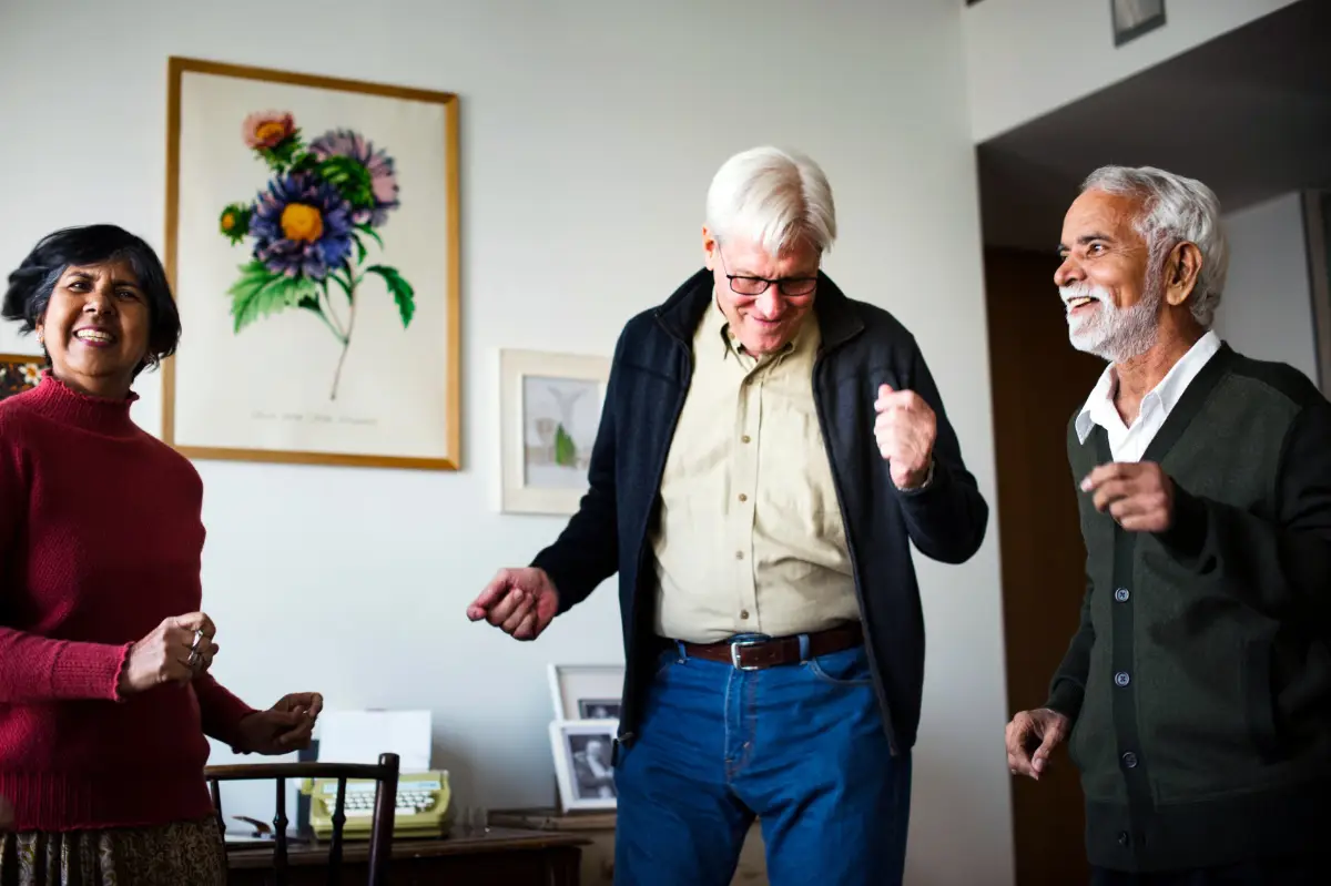 Older adults dancing together joyfully